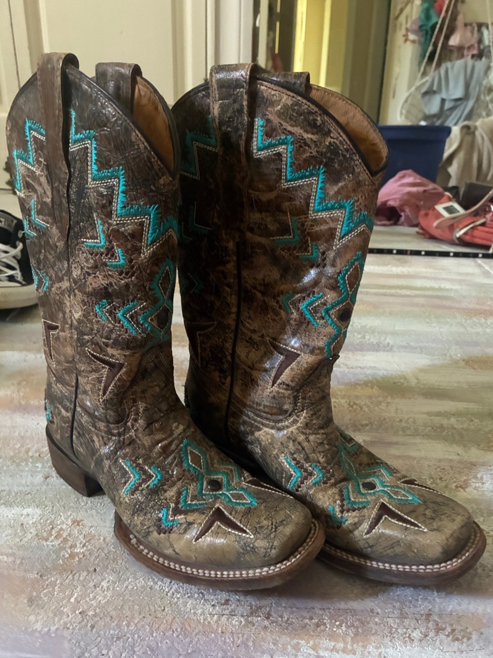 Corral brown with teal stitching boots